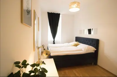 Ein Bett oder Betten in einem Zimmer der Unterkunft Gemütliches Stadtnest l LF16