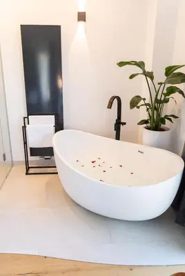 Ein Badezimmer in der Unterkunft geislerAPPARTMENTS