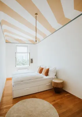 Ein Bett oder Betten in einem Zimmer der Unterkunft Central Design-Apartment next to Belvedere Castle