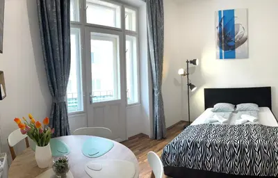 Ein Bett oder Betten in einem Zimmer der Unterkunft Big and comfortable Mariahilfer Apartment