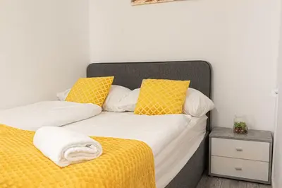 Ein Bett oder Betten in einem Zimmer der Unterkunft Standard 3 Rooms Near Hauptbahnhof
