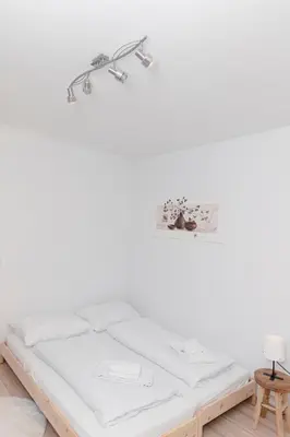 Ein Bett oder Betten in einem Zimmer der Unterkunft Beautiful 2-bedroom apartment near Schönbrunn