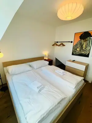 Ein Bett oder Betten in einem Zimmer der Unterkunft OrestaLiving - Penthouse with private terrace