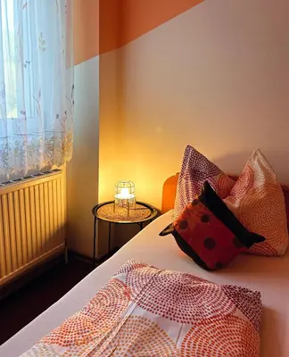Ein Bett oder Betten in einem Zimmer der Unterkunft Frühstückspension Elena Nicoleta Caltun