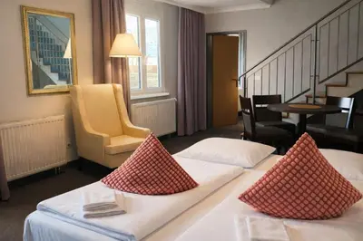 Ein Bett oder Betten in einem Zimmer der Unterkunft 24hours Apartment Hotel