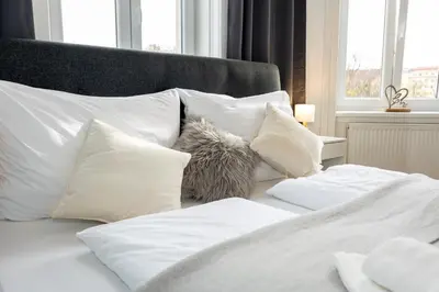 Ein Bett oder Betten in einem Zimmer der Unterkunft Turquoise inspired deluxe centrally located
