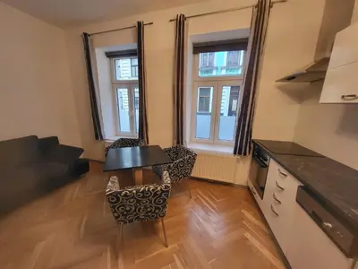 Küche/Küchenzeile in der Unterkunft CozyNite Premium Apartment Hundertwasser