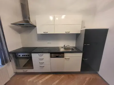 Küche/Küchenzeile in der Unterkunft CozyNite Premium Apartment Hundertwasser