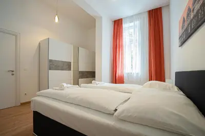 Ein Bett oder Betten in einem Zimmer der Unterkunft Apartment in the central area. 5 minute's walk to the Danube.
