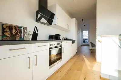 Küche/Küchenzeile in der Unterkunft OrestaLiving - Penthouse with designer renovation