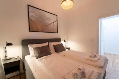 Ein Bett oder Betten in einem Zimmer der Unterkunft josef's home I Comfort Apartment I Metro Access