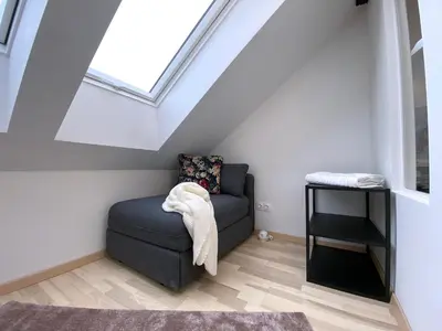 Ein Sitzbereich in der Unterkunft Stilvolle Dachgeschosswohnungen mit Balkon in Innenstadt Nähe