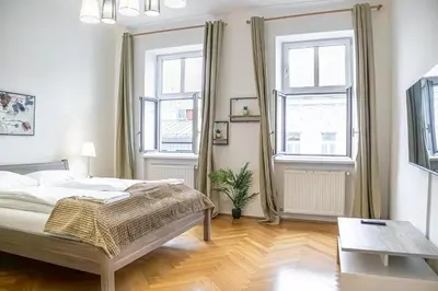 Ein Bett oder Betten in einem Zimmer der Unterkunft Affordable 2BR Apt-Near Wiener Stadthalle