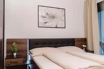 Ein Bett oder Betten in einem Zimmer der Unterkunft 10 minutes to the center, 2 minutes to the metro