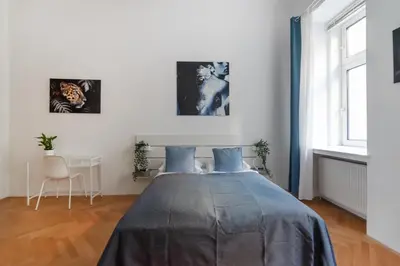 Ein Bett oder Betten in einem Zimmer der Unterkunft Zentrale Ruhelage im typischen Wiener Altbau