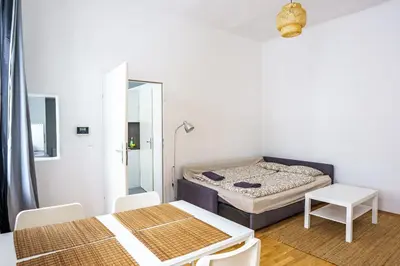 Ein Bett oder Betten in einem Zimmer der Unterkunft Vienna City Apartments Barnabitengasse