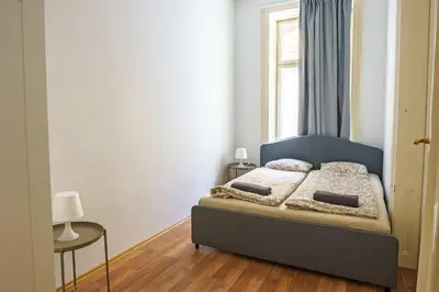Ein Bett oder Betten in einem Zimmer der Unterkunft Vienna City Apartments 1090 Vienna