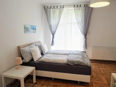Ein Bett oder Betten in einem Zimmer der Unterkunft City Villa Schönbrunn Apartments - Contactless 24h Check-In