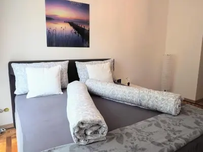 Ein Bett oder Betten in einem Zimmer der Unterkunft City Villa Schönbrunn Apartments - Contactless 24h Check-In