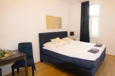 Ein Bett oder Betten in einem Zimmer der Unterkunft Stilvolle Urbane Auszeit l LF19