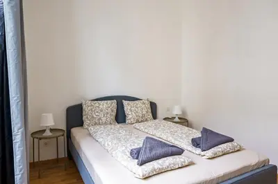 Ein Bett oder Betten in einem Zimmer der Unterkunft Vienna City Apartments Ottakring