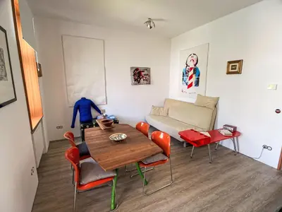 Ein Sitzbereich in der Unterkunft Apartment Happy Pasetti by Interhome