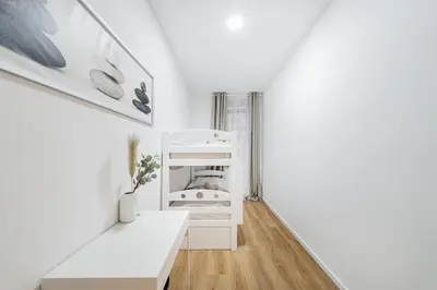 Ein Bett oder Betten in einem Zimmer der Unterkunft Central City Rooms by Home2