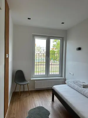 Ein Bett oder Betten in einem Zimmer der Unterkunft Lion`s Rooms n Apartments