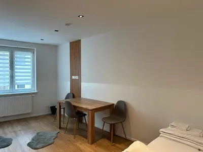 Ein Bett oder Betten in einem Zimmer der Unterkunft Lion`s Rooms n Apartments