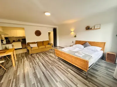 Ein Bett oder Betten in einem Zimmer der Unterkunft Gemütliche Wohnung nähe Hauptbahnhof und Zentrum