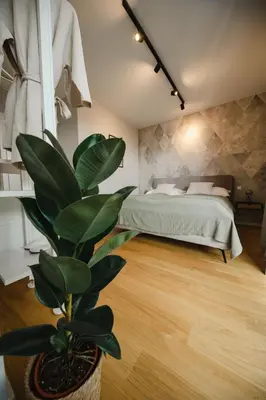 Ein Bett oder Betten in einem Zimmer der Unterkunft URBAN UNIT - nearby city center