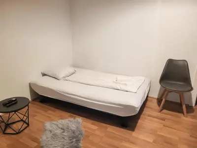 Ein Bett oder Betten in einem Zimmer der Unterkunft Floridsdorfer Apartment - Free Highspeed-Internet