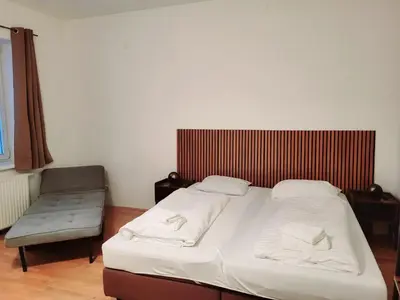 Ein Bett oder Betten in einem Zimmer der Unterkunft Floridsdorfer Apartment - Free Highspeed-Internet