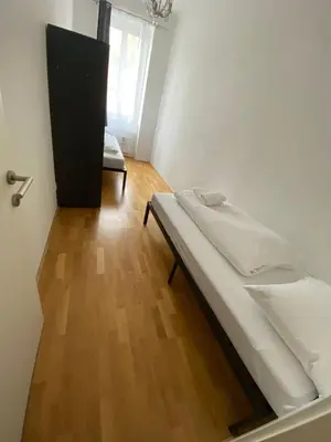 Ein Bett oder Betten in einem Zimmer der Unterkunft Floridsdorfer Apartment - Free Highspeed-Internet
