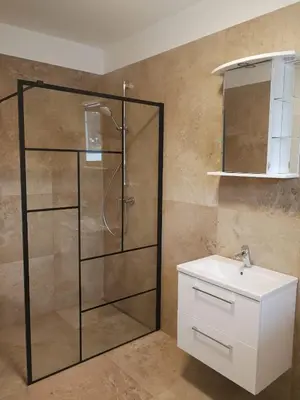 Ein Badezimmer in der Unterkunft TEREC HAUS