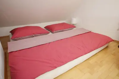 Ein Bett oder Betten in einem Zimmer der Unterkunft Traumhaft großes, sonniges Haus in Wien Nähe