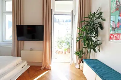 TV/Unterhaltungsangebot in der Unterkunft Smart Apt mit Balkon am Augarten park Nähe Zentrum