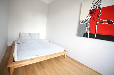Ein Bett oder Betten in einem Zimmer der Unterkunft Classic, Modern & Sunny. 7min to Vienna’s center!