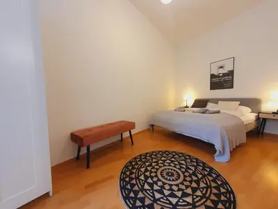 Ein Bett oder Betten in einem Zimmer der Unterkunft Savoir Vivre Apartments Rueppgasse