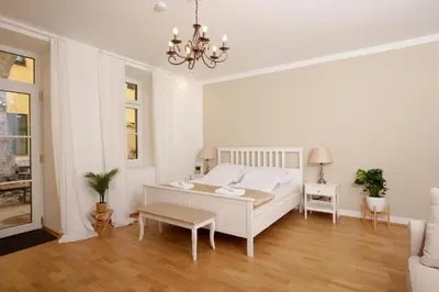 Ein Bett oder Betten in einem Zimmer der Unterkunft Augarten Apartments