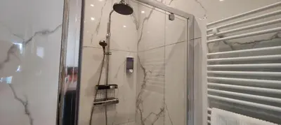 Ein Badezimmer in der Unterkunft XuBa ApartmentRooms I Wien Messe Prater I Küchenzeile