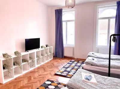 Ein Bett oder Betten in einem Zimmer der Unterkunft Brand New Spacious & Stylish Aptmt in City-Centre