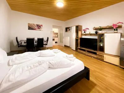 Ein Bett oder Betten in einem Zimmer der Unterkunft Marios Luxus Apartment