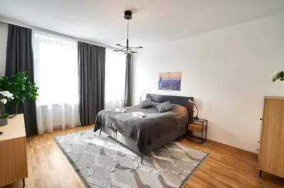 Ein Bett oder Betten in einem Zimmer der Unterkunft Trendy Apartment zentral gelegen