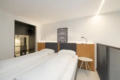 Ein Bett oder Betten in einem Zimmer der Unterkunft Fesh Lofts