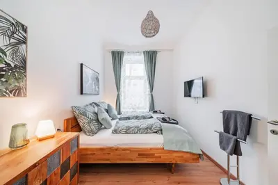 Ein Bett oder Betten in einem Zimmer der Unterkunft 3 Bedrooms - 75sqm - 15 Min. City Center