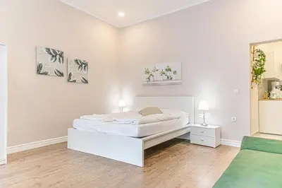 Ein Bett oder Betten in einem Zimmer der Unterkunft Stylish Apartment Wiener Stadthalle