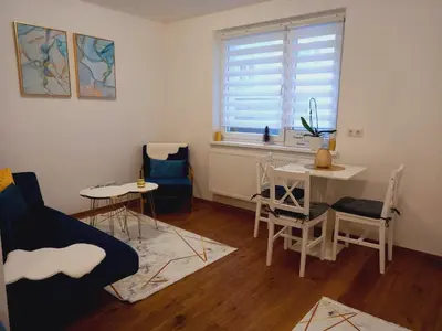 Ein Sitzbereich in der Unterkunft Lauro Apartment