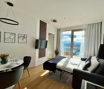 Ein Bett oder Betten in einem Zimmer der Unterkunft Cozy Property at Belvedere
