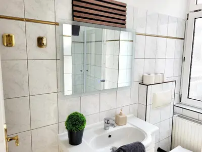 Ein Badezimmer in der Unterkunft Oswald Apartments Vienna